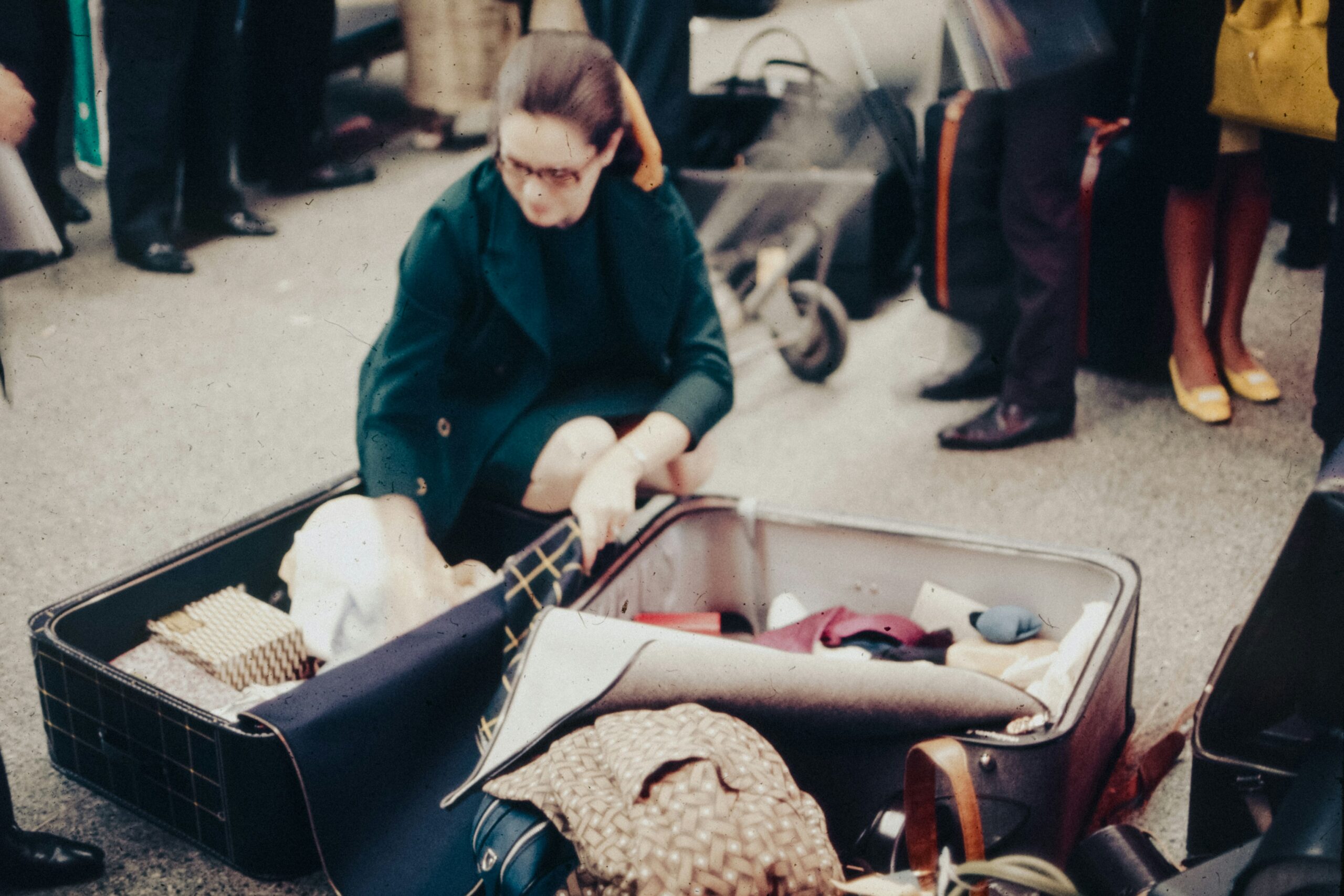 woman packing suitcase